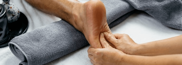 masaža stopal za povečanje moči